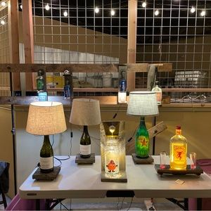 Lamps and decanters. Made with authentic barn wood or whiskey barrel staves.